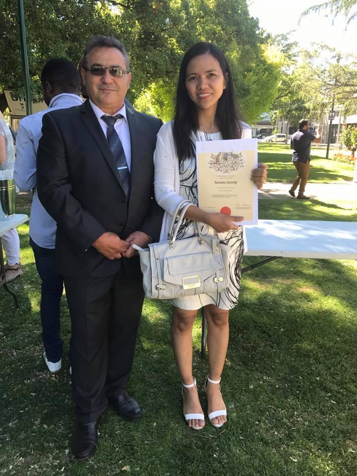 Filipina becoming an Aussie at a citizenship ceremony